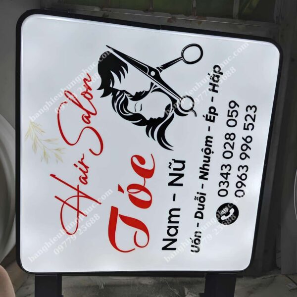 biển vẫy cắt tóc