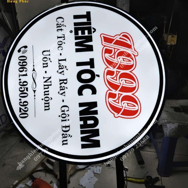 biển vẫy cắt tóc